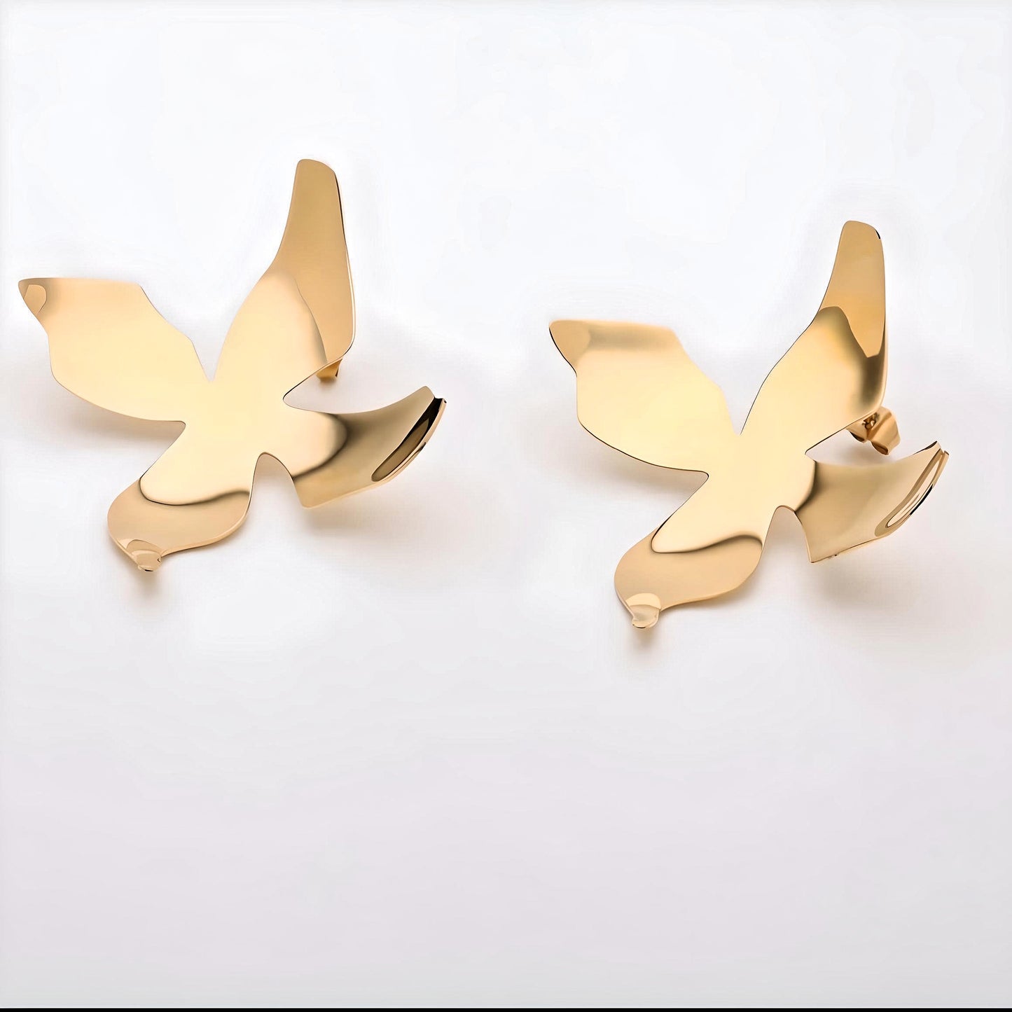 Radiate Elegance: Gold Flower Stud Earrings - Stainless Steel Spring Design